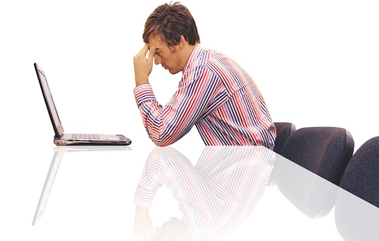 Poor posture at your desk can contribute to neck pain